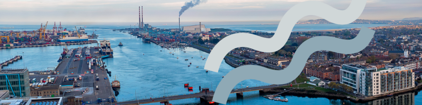 Aerial view of Dublin Docklands and the River Liffey on a clear day, showing modern waterfront buildings, bridges, and the city skyline. A large semi-transparent Dublin City Council logo overlays the centre of the image.