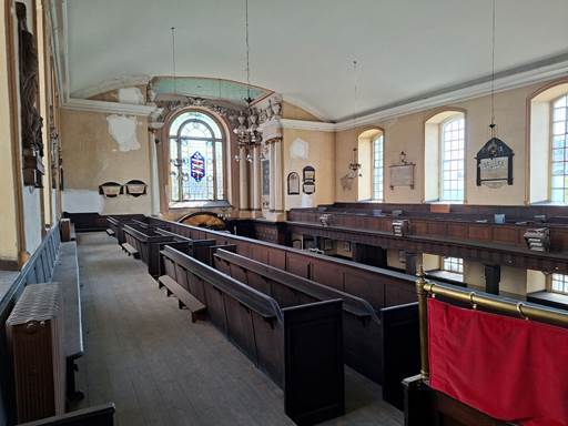 Upper gallery view of the stained glass window
